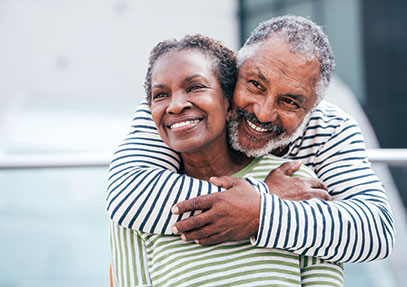 A married couple smiling. Links to Gifts of Appreciated Securities A married couple smiling. Links to Gifts of Appreciated Securities