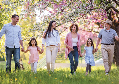 A family walking outside. Links to Gifts That Pay You Income A family walking outside. Links to Gifts That Pay You Income